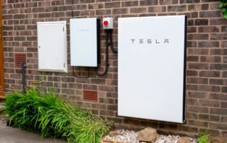 photo of a Tesla power wall unit with storage installed on a wall