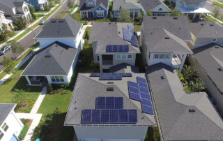 Evergreen Residential Solar arrays on a couple of house rooftops.
