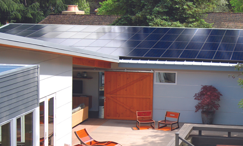 Photo of home with rooftop covered in solar panels